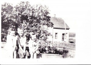 Eldon George with sisters Mary and Jean, 1938.